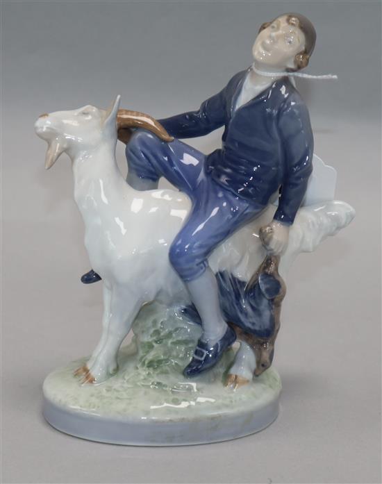 A Royal Copenhagen figure of Hans Clodhopper, boy riding a goat, No. 1228 height 18cm